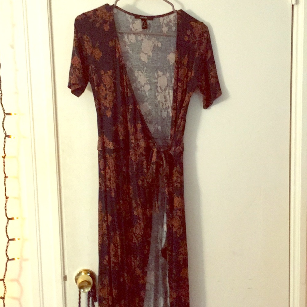 Green and gold crossbody maxi dress.